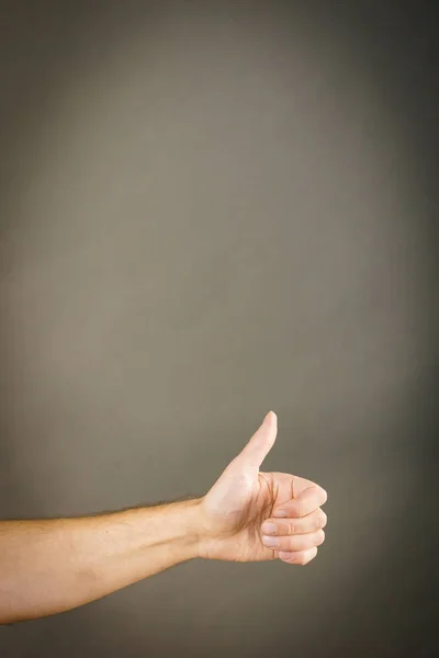 Unrecognizable Person Human Hand Showing Thumb Gesture Dark Gray Background — Stock Photo, Image
