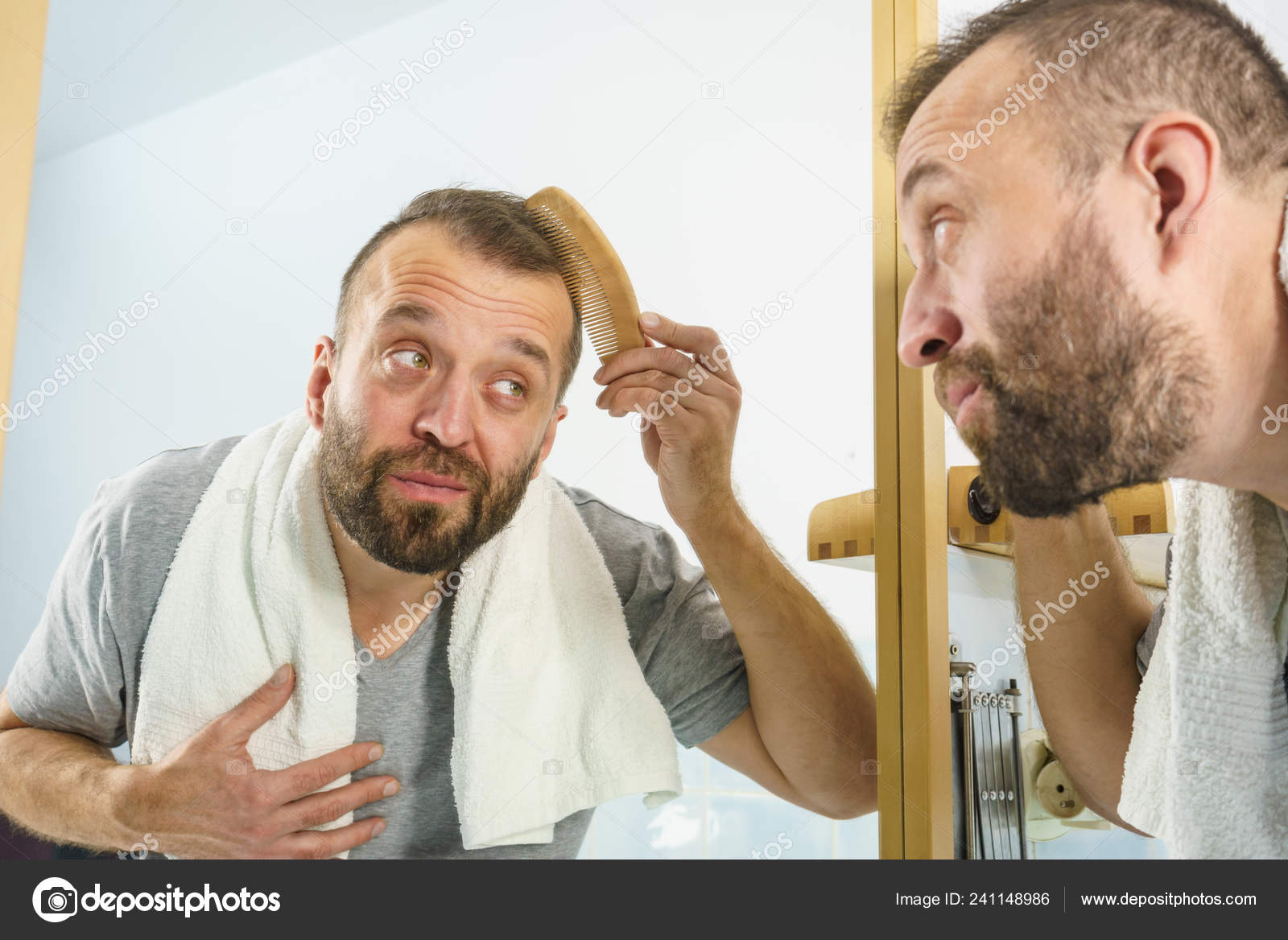 Adult Man Standing Front Bathroom Mirror Brushing His Short Hair