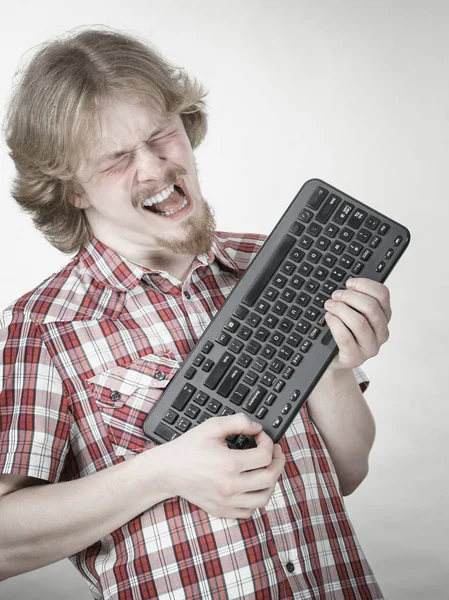 Nerd Geek Young Adult Man Playing Video Games Holding Computer — Stock Photo, Image