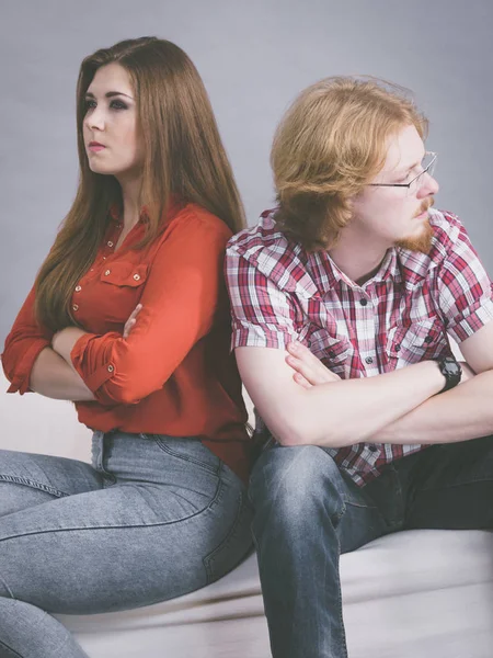 Woman and man after argue on sofa — Stock Photo, Image