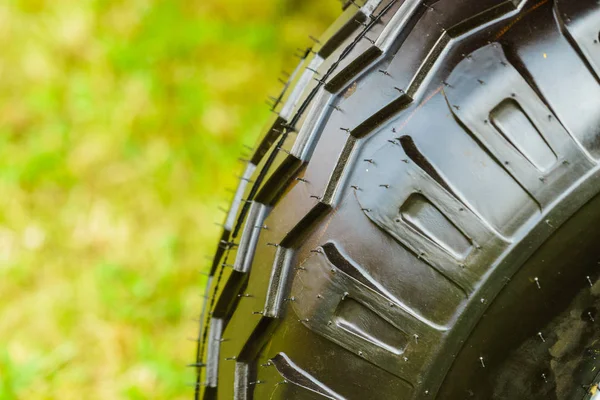 Detailed closeup of rubber tire wheel surface. — Stock Photo, Image