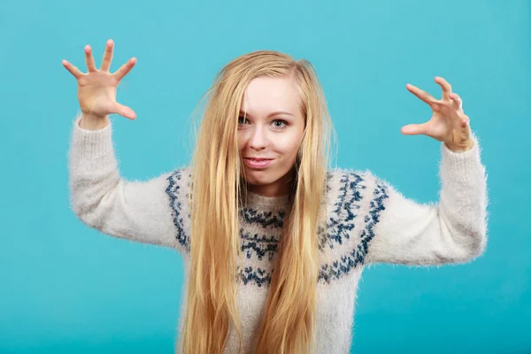 Young blonde woman making scary faces — Stock Photo, Image