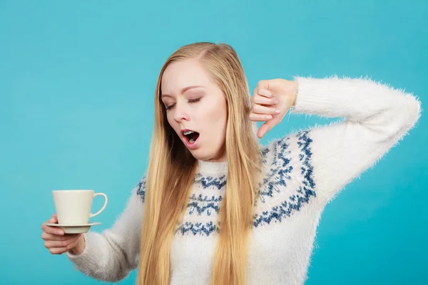 Sleepy woman holding cup of coffee — Stock Photo, Image