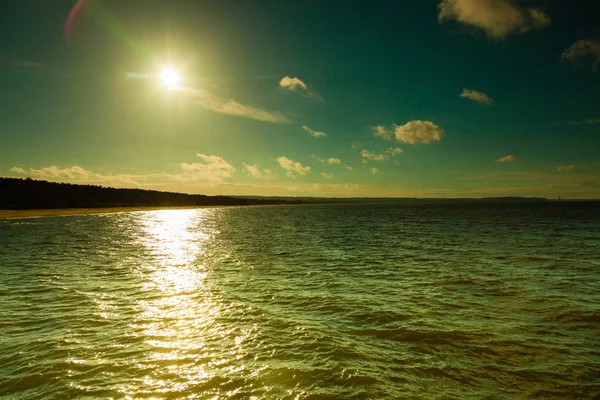 Blue ocean and sunny sky with clouds — Stock Photo, Image