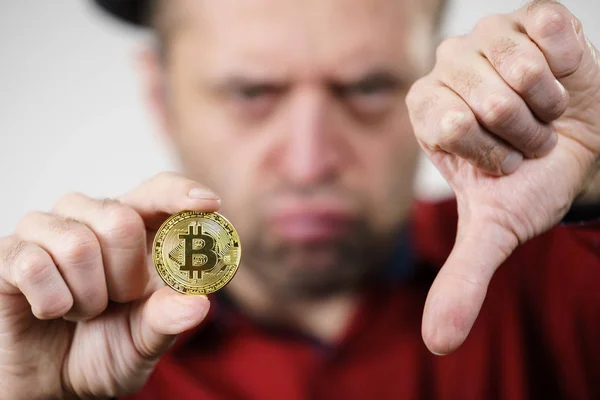 Man having bitcoin coin — Stock Photo, Image