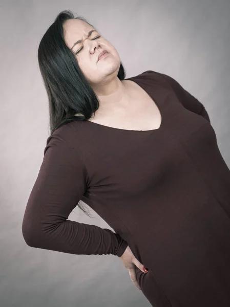 Kobieta o biodra ból brzucha — Zdjęcie stockowe