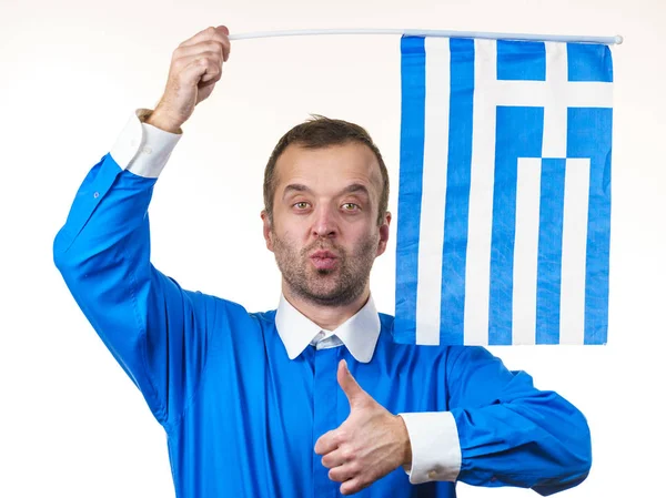 Lycklig man som innehar grekisk flagga — Stockfoto