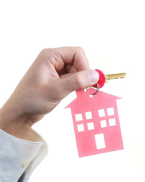 Man hand holding home keys — Stock Photo, Image