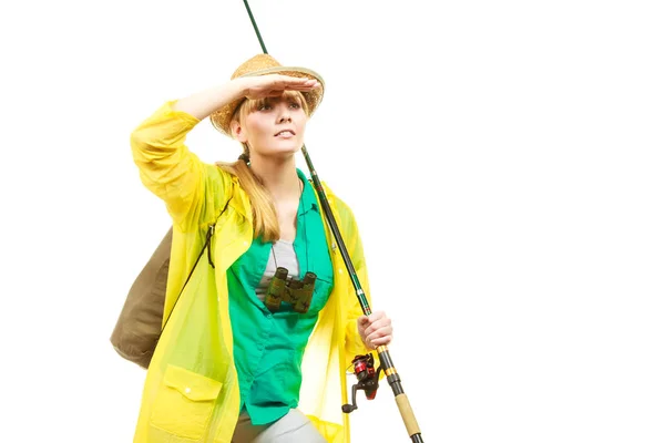 Femme avec canne à pêche, équipement de filature — Photo