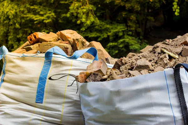 Two big bags container with rubble. — Stock Photo, Image