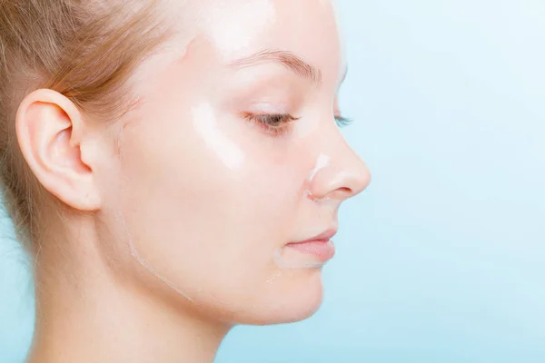 Close up woman in facial peel off mask. — Stock Photo, Image