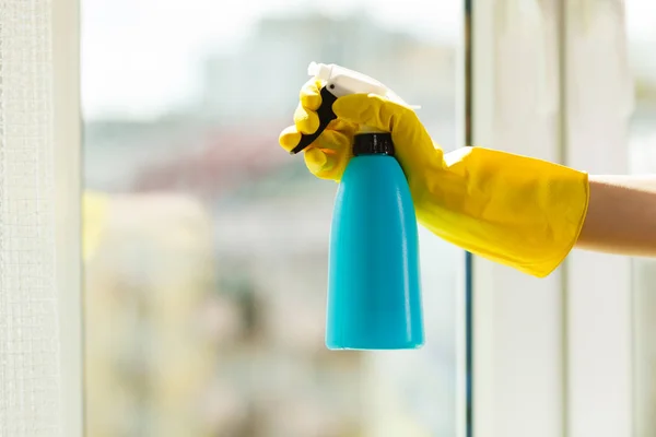 Hand cleaning window at home using detergent rag — Stock Photo, Image