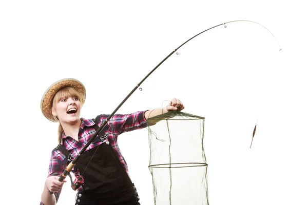 Happy woman holding fishing rod and keepnet — Stock Photo, Image