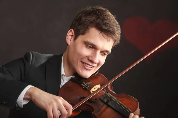 Man man klädd elegant spela fiol — Stockfoto
