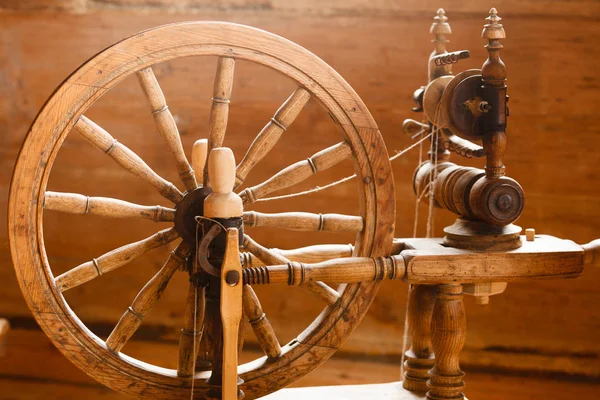 Oldfashioned wooden distaff, spindle, spinning wheel — Stock Photo, Image