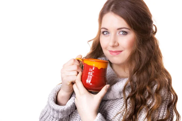 Woman holding red tea coffee mug — Stock Photo, Image