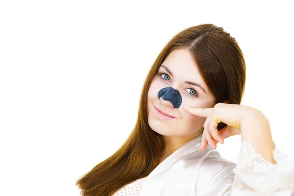 Woman applying pore strips on nose — Stock Photo, Image