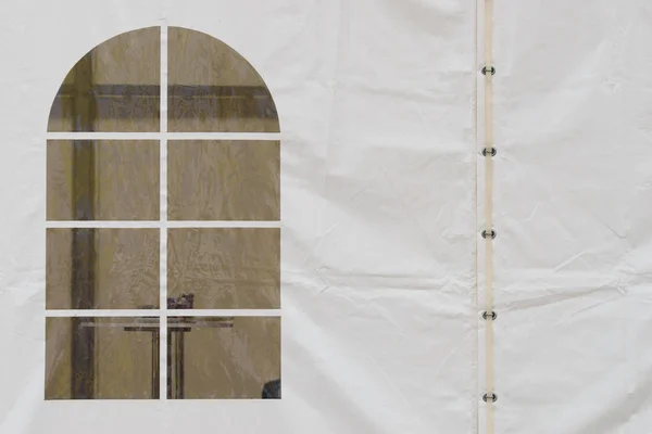 Plastic window in white event tent — Stock Photo, Image