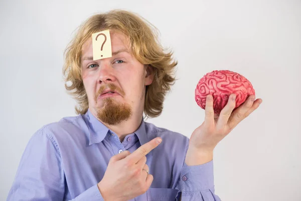 Hombre jugando con el cerebro humano —  Fotos de Stock