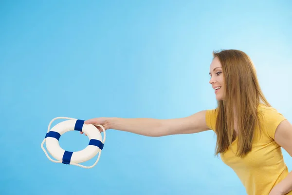 Girl holds life buoy rescue ring — Stock Photo, Image