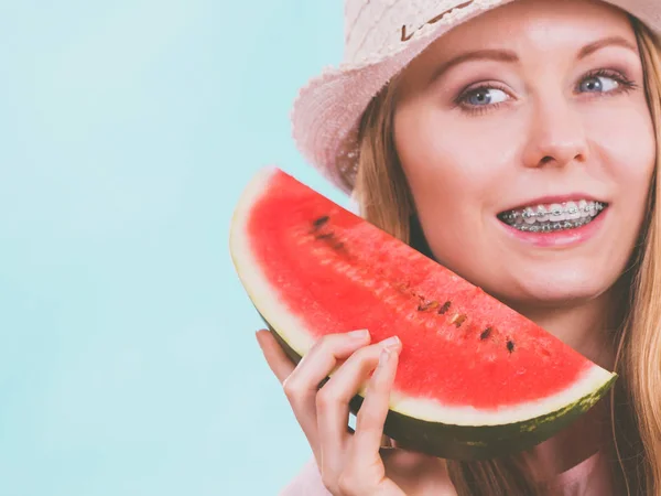 Happy woman holding watermelon — Stock Photo, Image