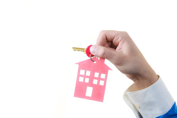 Man hand holding home keys — Stock Photo, Image