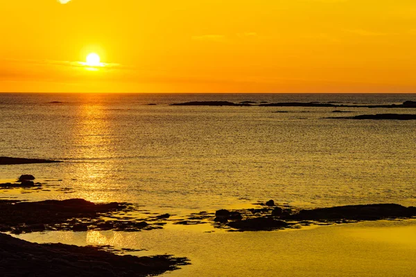 Sea cape at midnight sun on Andoya, Norway — стоковое фото