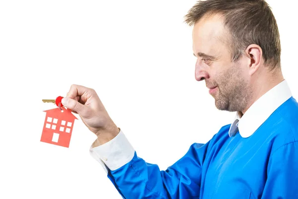 Man holding home keys — Stock Photo, Image