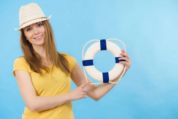 Girl holds life buoy rescue ring — Stock Photo, Image