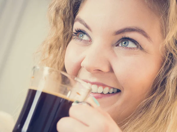 Positive woman drinking her morning coffee Royalty Free Stock Photos