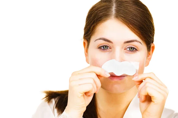 Woman applying pore strips on nose — Stock Photo, Image