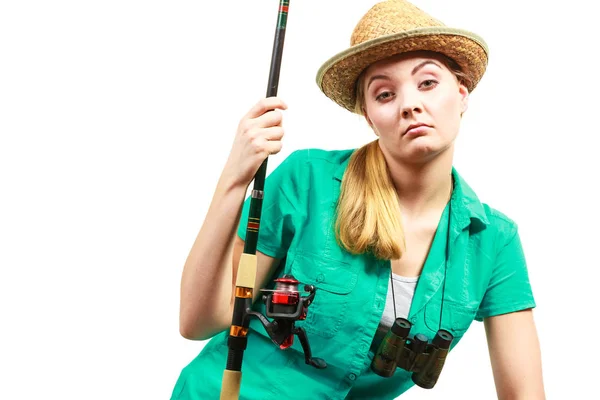 Femme ennuyée avec canne à pêche, équipement de filature — Photo