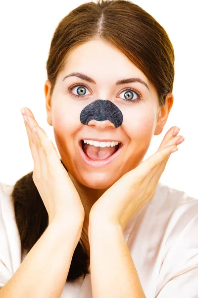 Woman applying pore strips on nose — Stock Photo, Image