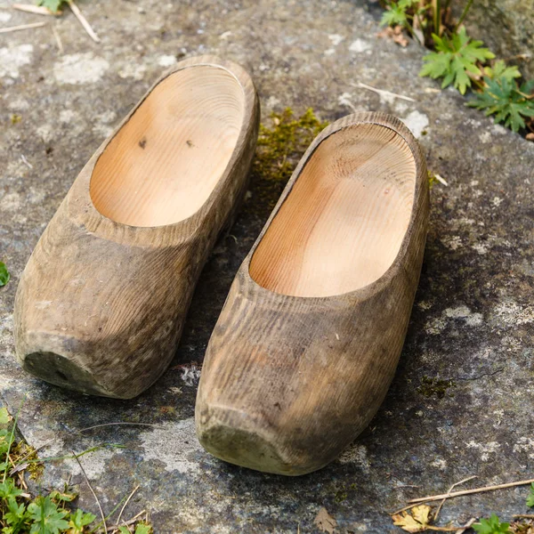 Closeup wooden dutch shoes, traditional clogs footwear — Stock Photo, Image