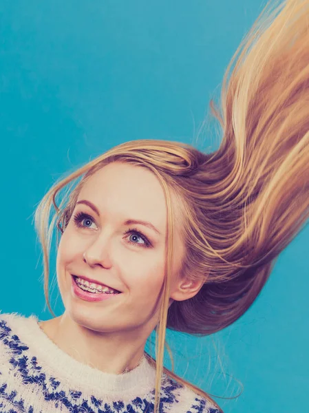 Crazy blonde woman with windblown blonde hair — Stock Photo, Image