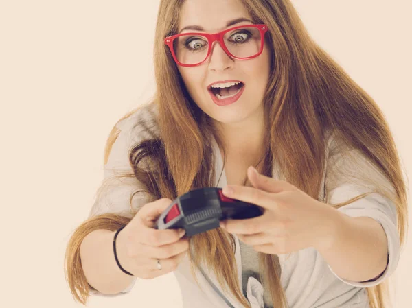 Gamer woman holding gaming pad — Stock Photo, Image