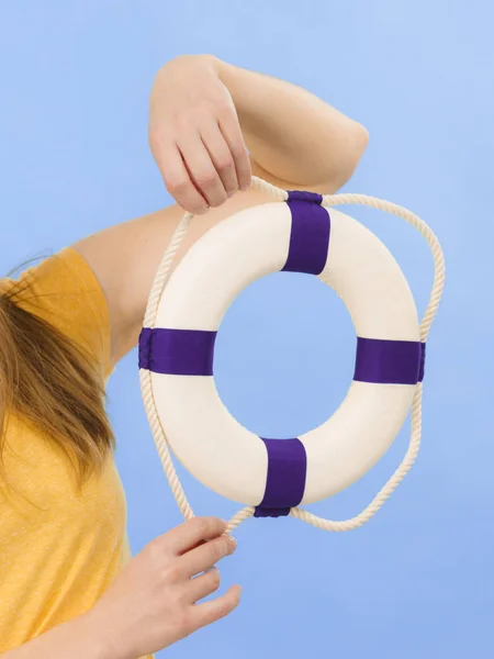 Hand holds life buoy rescue ring — Stock Photo, Image