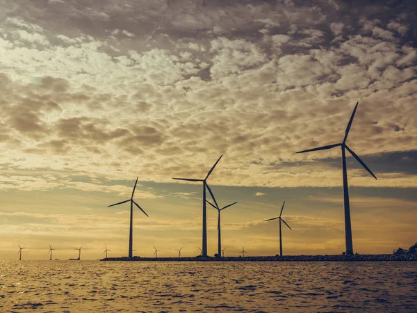 Wind turbines power generator farm along coast sea — Stock Photo, Image