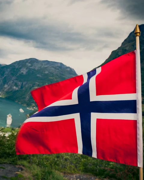 Norwegian flag and Geiranger fjord landscape — Stock Photo, Image