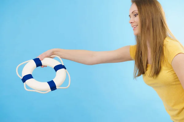 Girl holds life buoy rescue ring — Stock Photo, Image