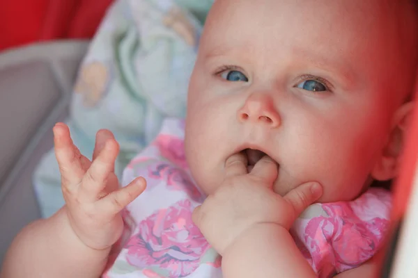 Little happy baby in stroller — Stock Photo, Image