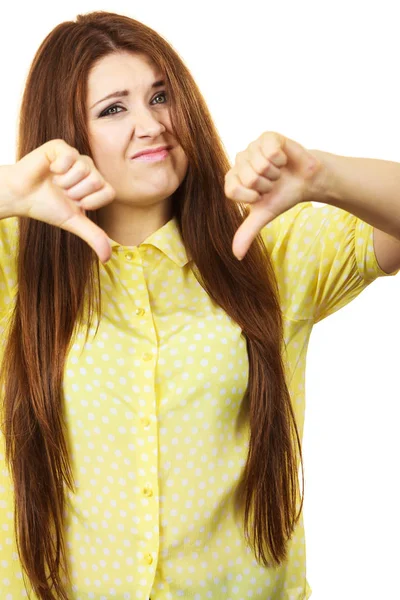 Woman showing thumb down gesture — Stock Photo, Image