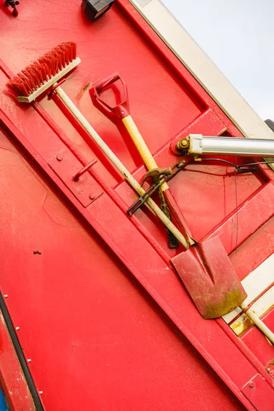 Garbage truck with broom and shovel. — Stock Photo, Image