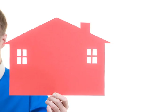 Mann hält Papier rotes Haus Modell — Stockfoto