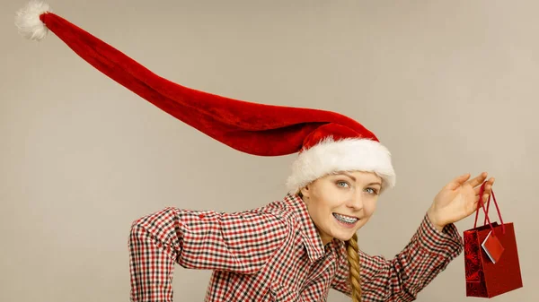 Happy woman wearing Santa Claus helper hat — Stock Photo, Image