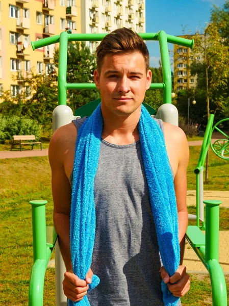 Young man relaxing after outdoor workout — Stock Photo, Image