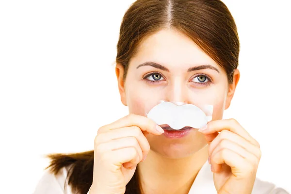 Woman applying pore strips on nose — Stock Photo, Image