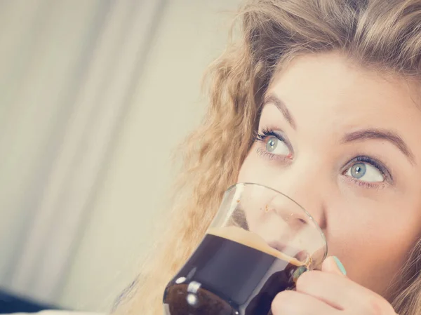 Positive woman drinking her morning coffee Royalty Free Stock Photos