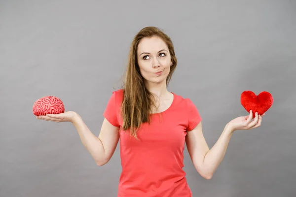 Young Doubtful Woman Trying Choose Love Mind Female Holding Heart — Stock Photo, Image