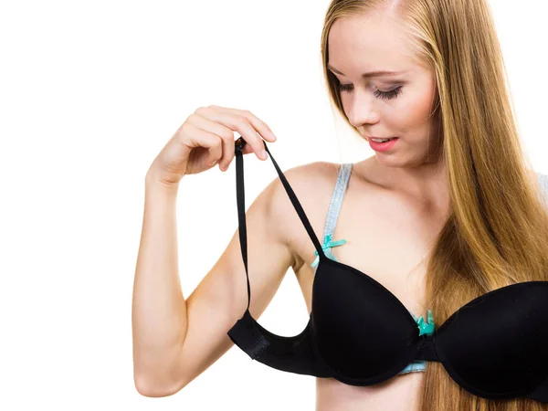 Young Slim Woman Holding Bra Strap Straps Keep Falling Problem Stock Photo  by ©Voyagerix 428139948